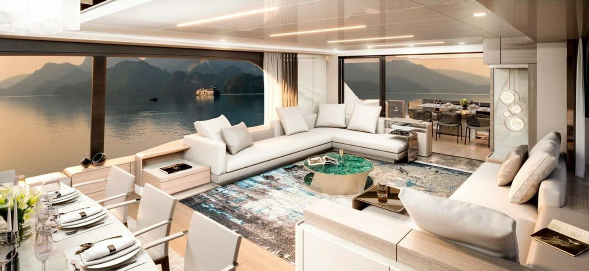 a room with a large white couch and a large window aboard ONE OWNER Yacht for Sale