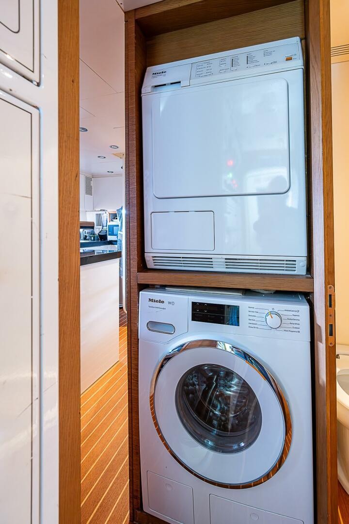 a white washing machine aboard INTERVENTION Yacht for Sale