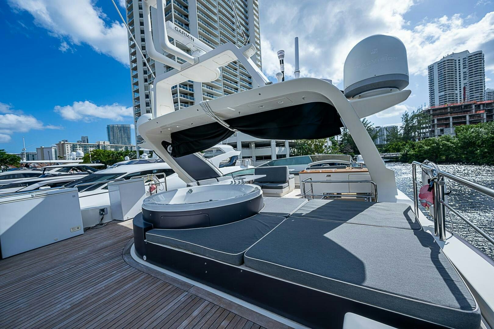 a large white boat on a deck aboard INTERVENTION Yacht for Sale