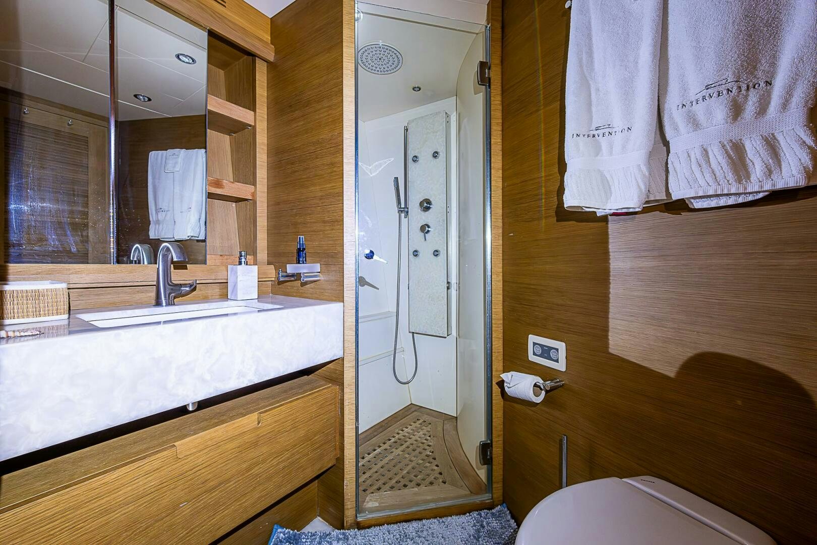 a bathroom with a large mirror aboard INTERVENTION Yacht for Sale