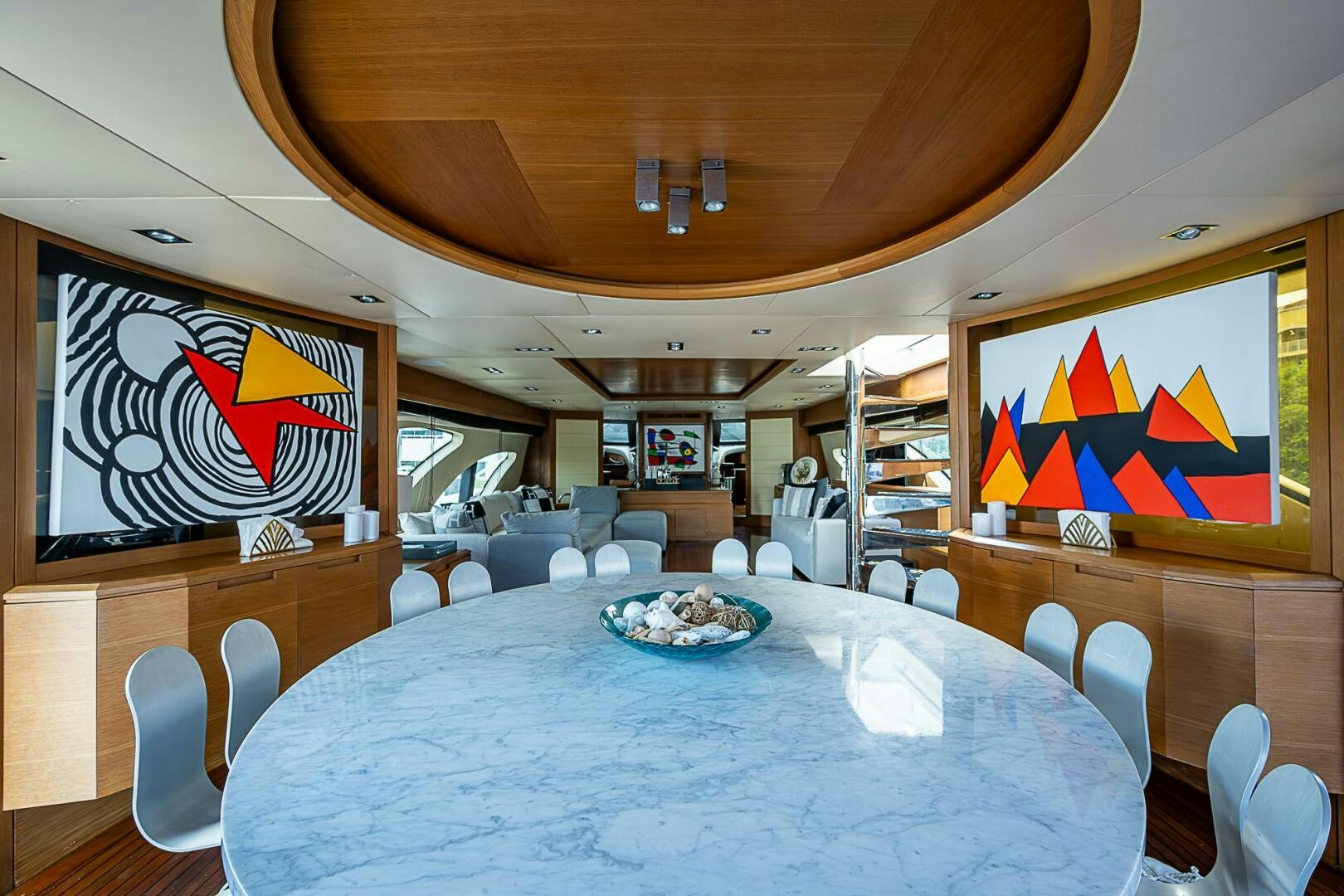 a dining room with a table and chairs aboard INTERVENTION Yacht for Sale