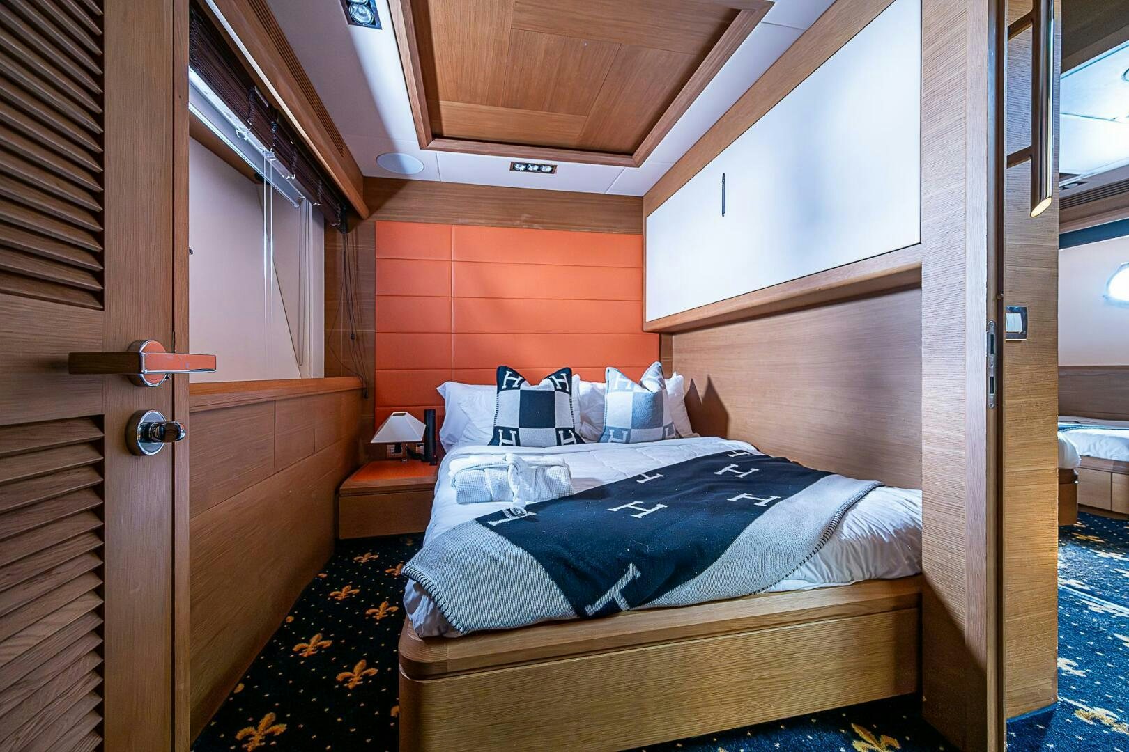 a bed in a room aboard INTERVENTION Yacht for Sale