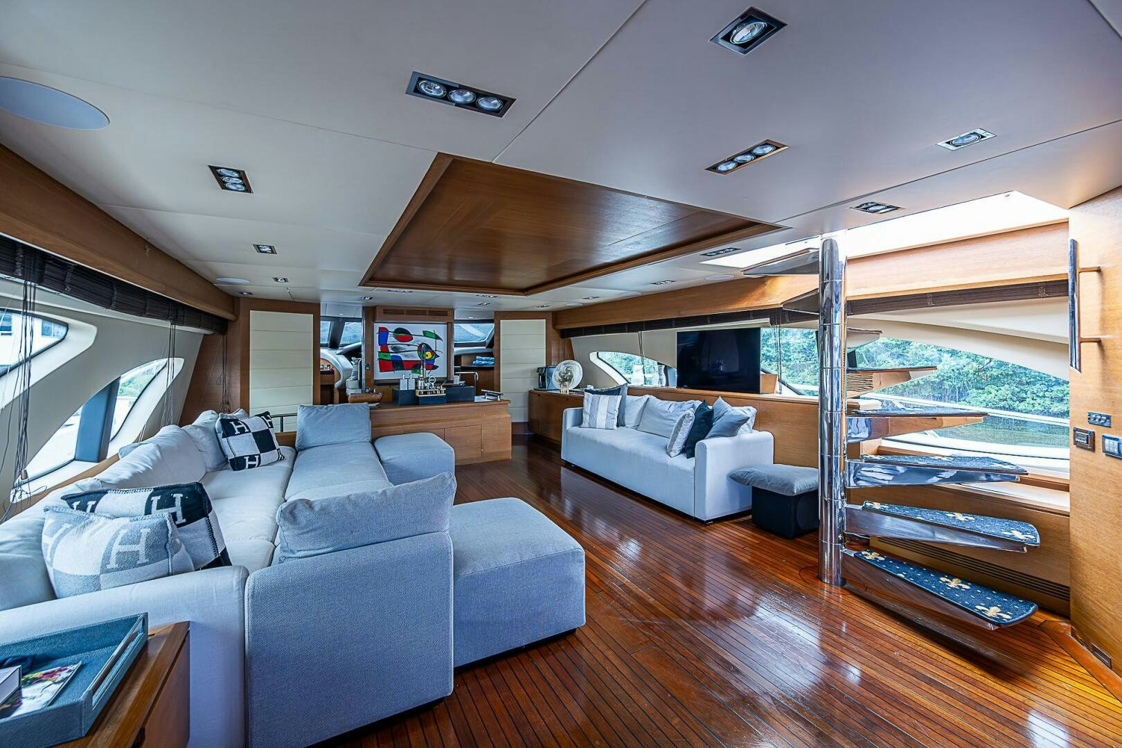 a living room with a bunk bed aboard INTERVENTION Yacht for Sale