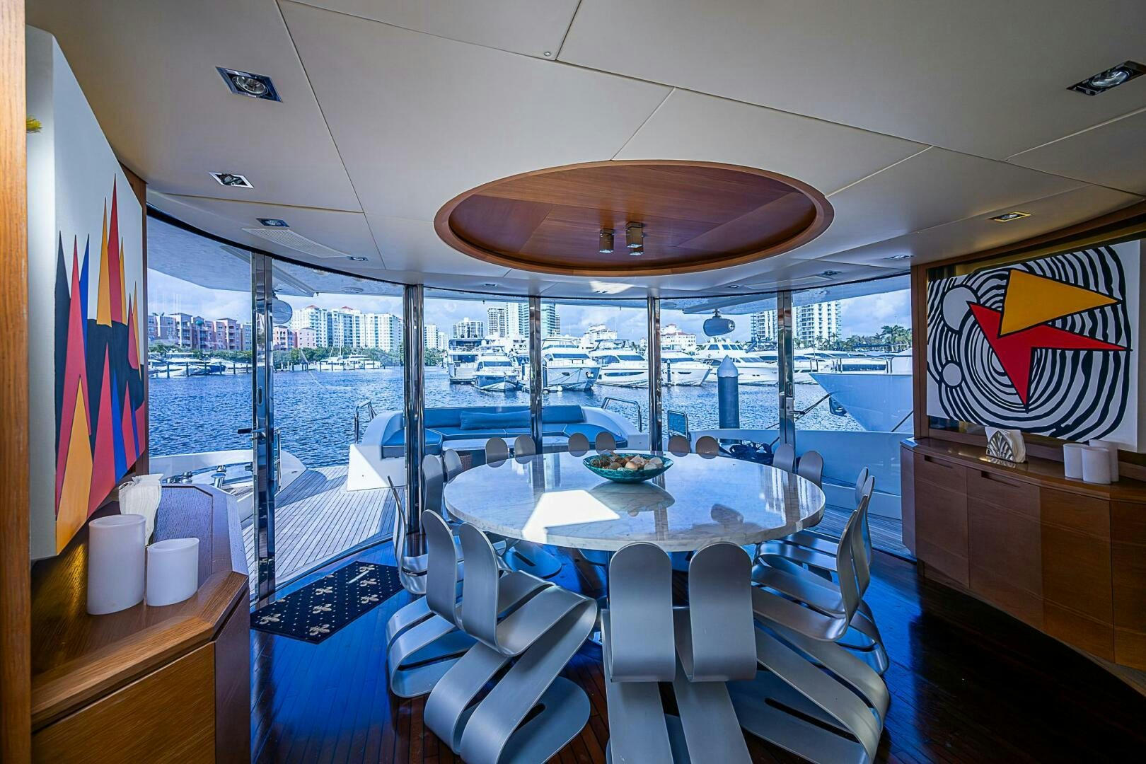 a boat with a table and chairs aboard INTERVENTION Yacht for Sale