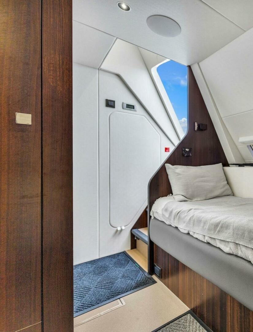 a small room with two beds aboard YOU AND ISLANDS Yacht for Sale