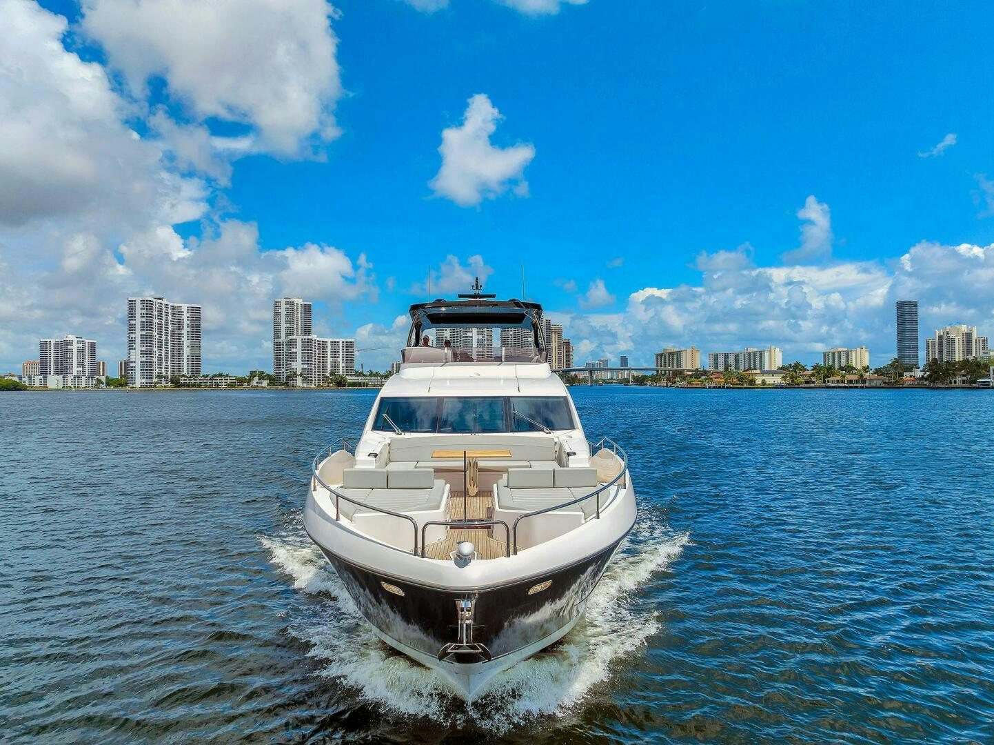 a white boat in the water aboard YOU AND ISLANDS Yacht for Sale
