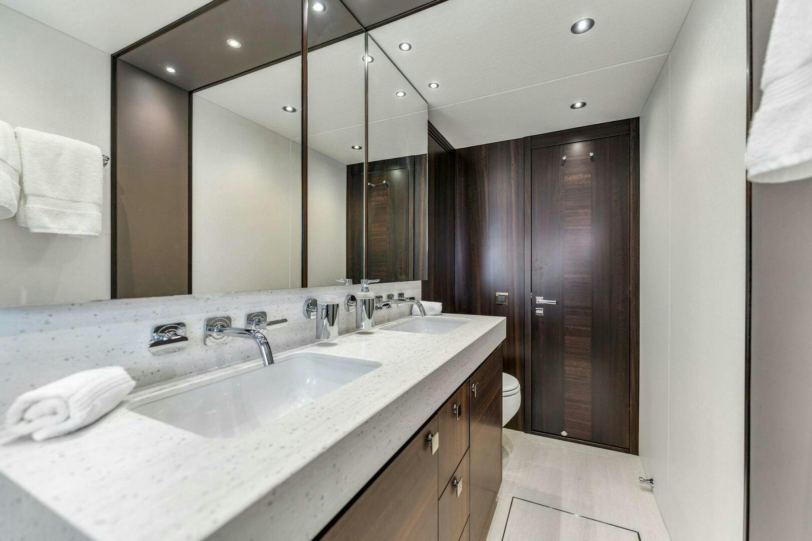 a bathroom with a sink and a mirror aboard YOU AND ISLANDS Yacht for Sale