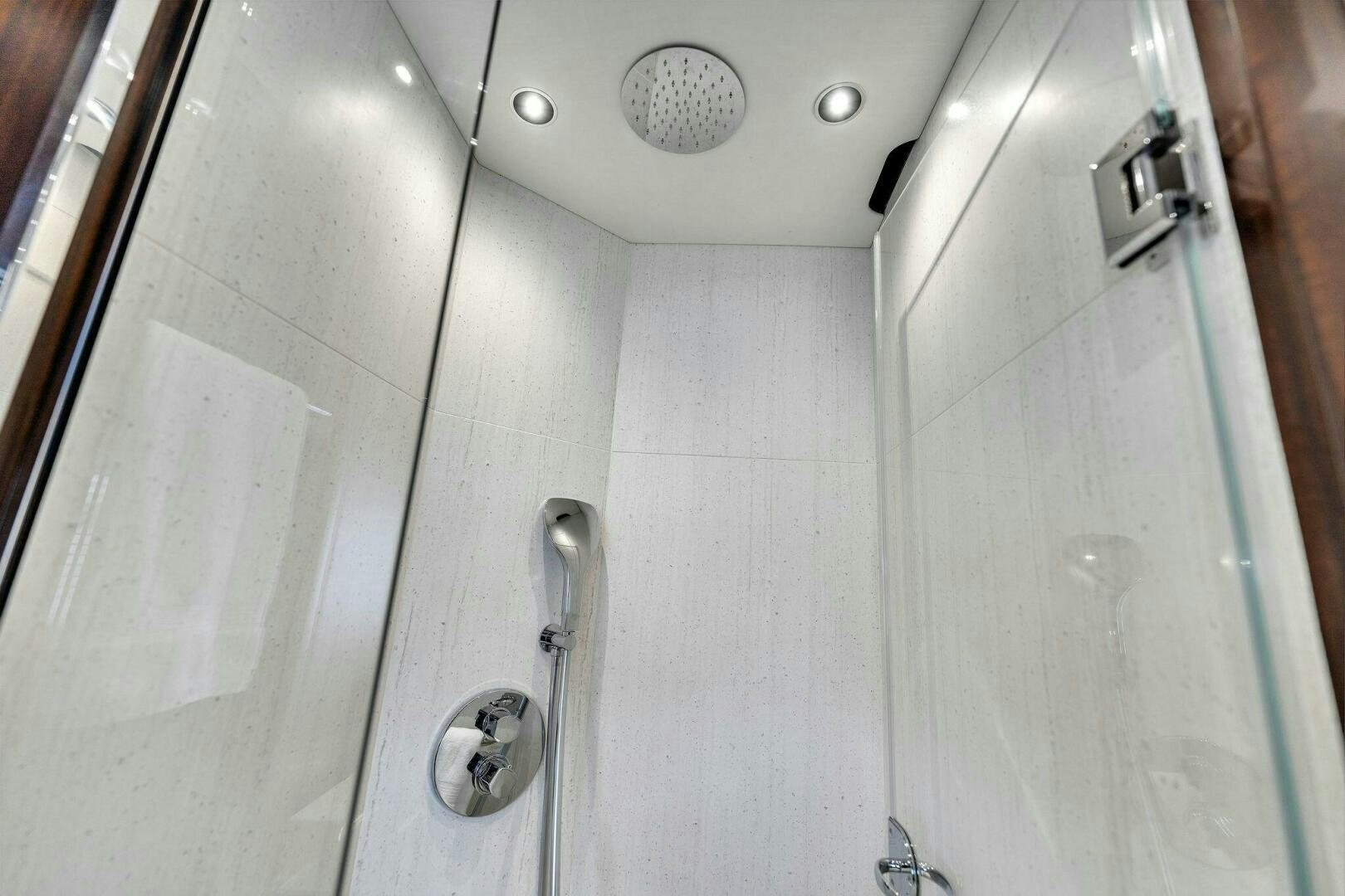a shower with a glass door aboard YOU AND ISLANDS Yacht for Sale