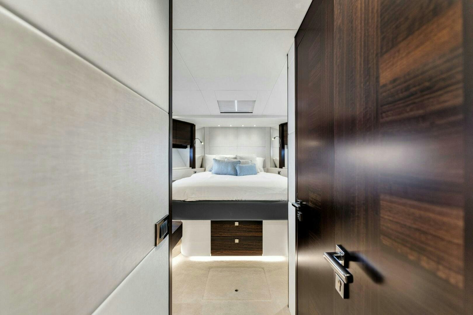 a room with a bed and a closet aboard YOU AND ISLANDS Yacht for Sale
