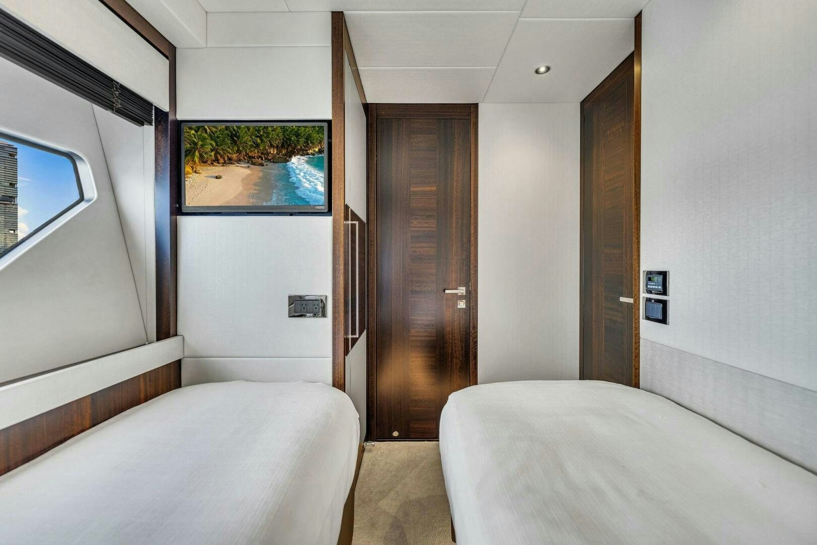 a room with two beds aboard YOU AND ISLANDS Yacht for Sale