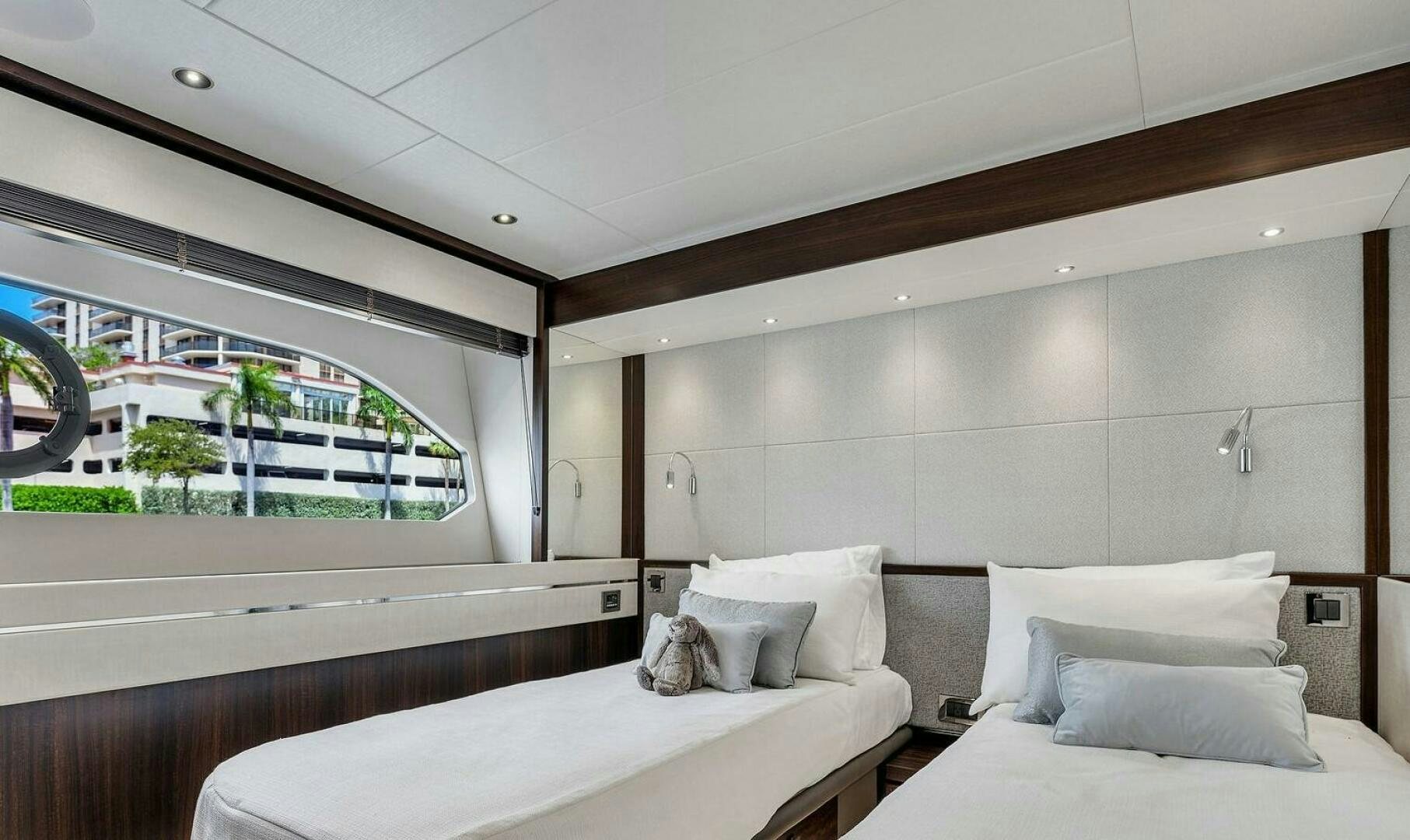 a room with a bed and a window aboard YOU AND ISLANDS Yacht for Sale