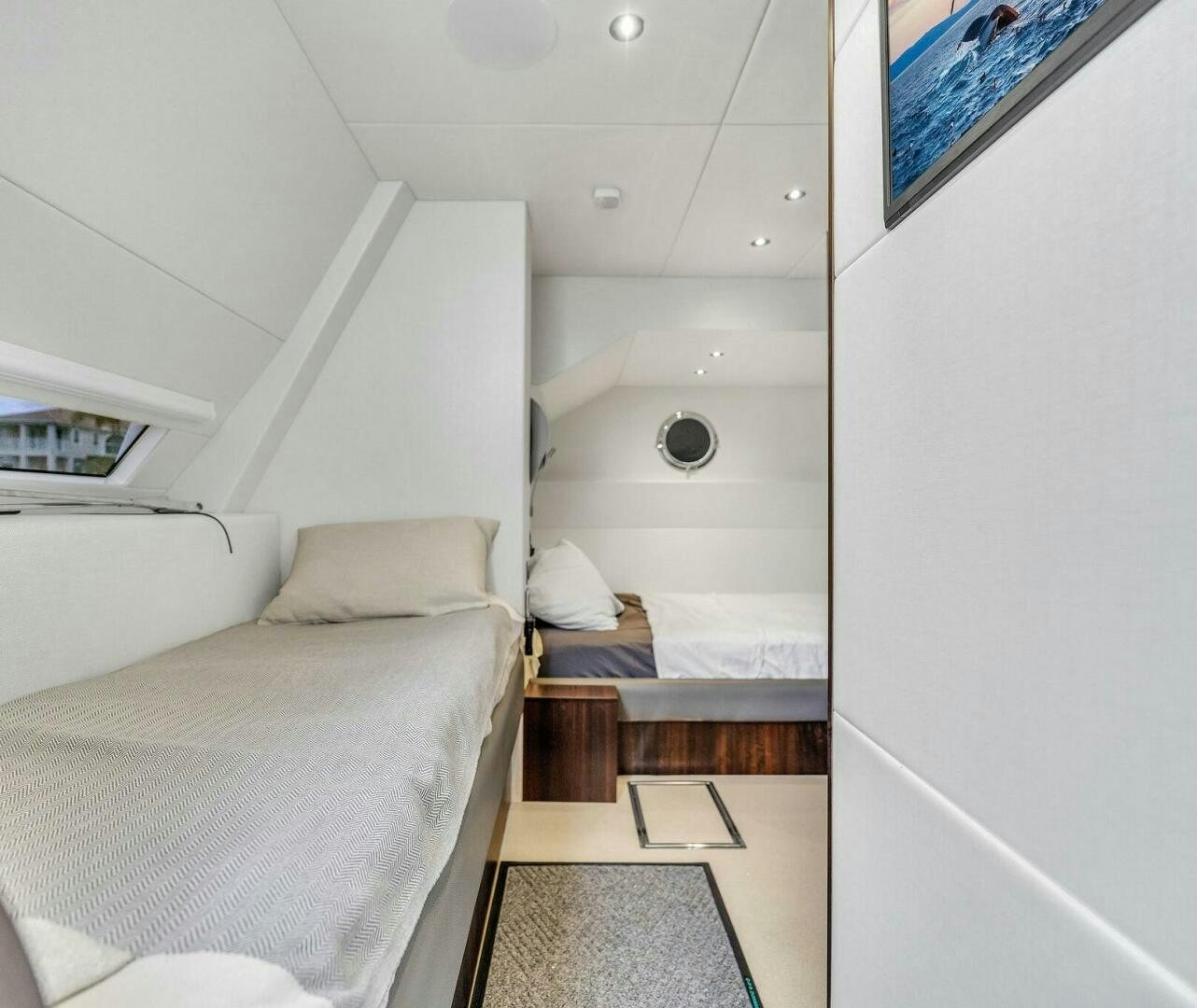 a room with two beds aboard YOU AND ISLANDS Yacht for Sale
