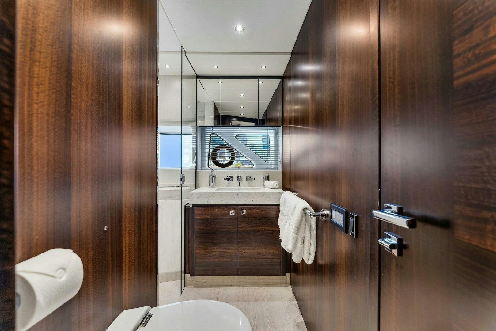 a bathroom with a shower and sink aboard YOU AND ISLANDS Yacht for Sale