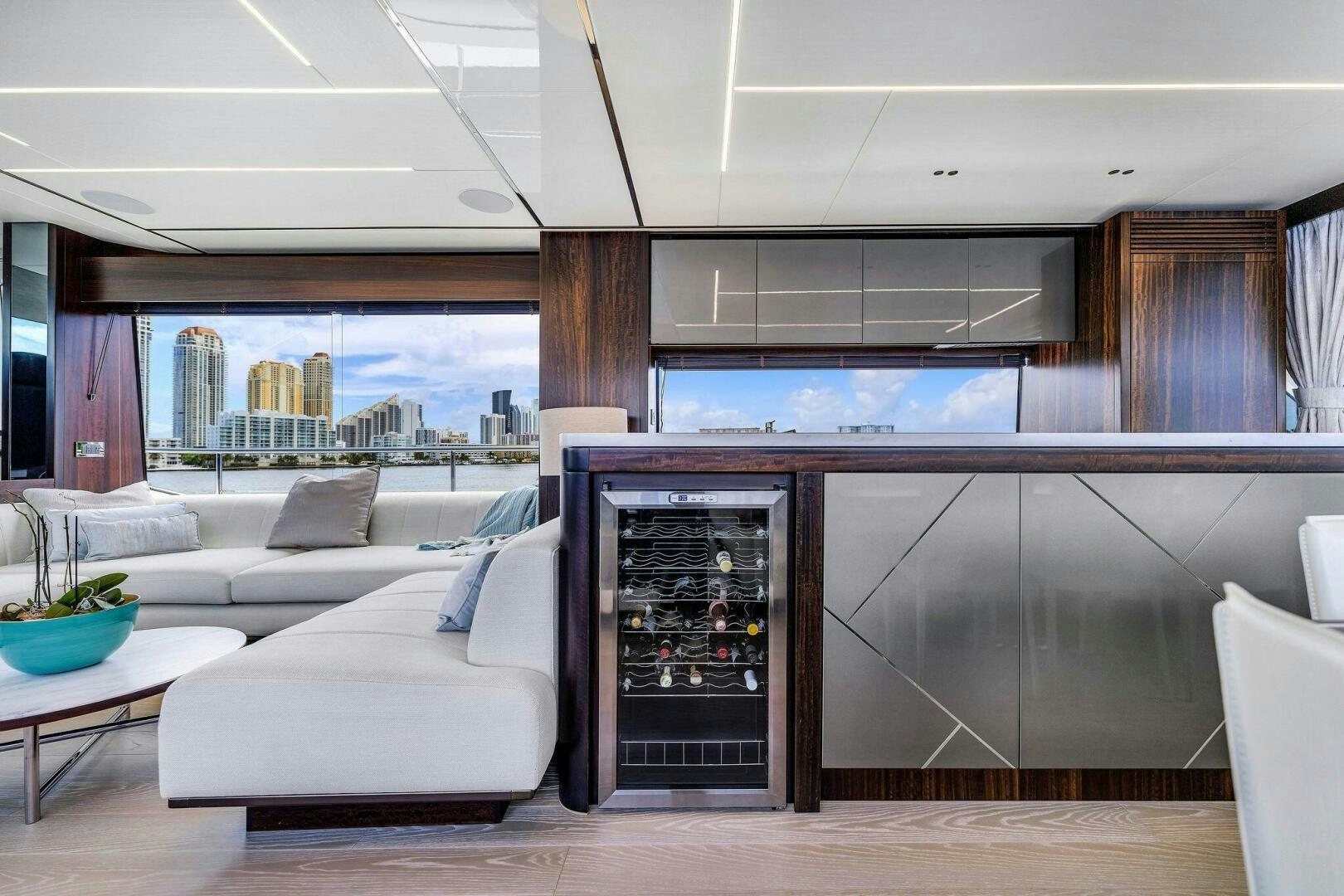 a room with a couch and a tv aboard YOU AND ISLANDS Yacht for Sale