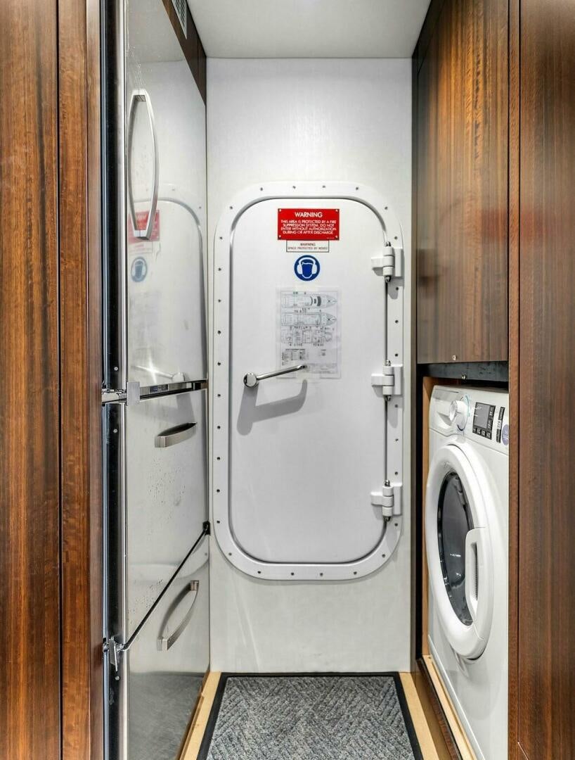 a door with a sign on it aboard YOU AND ISLANDS Yacht for Sale