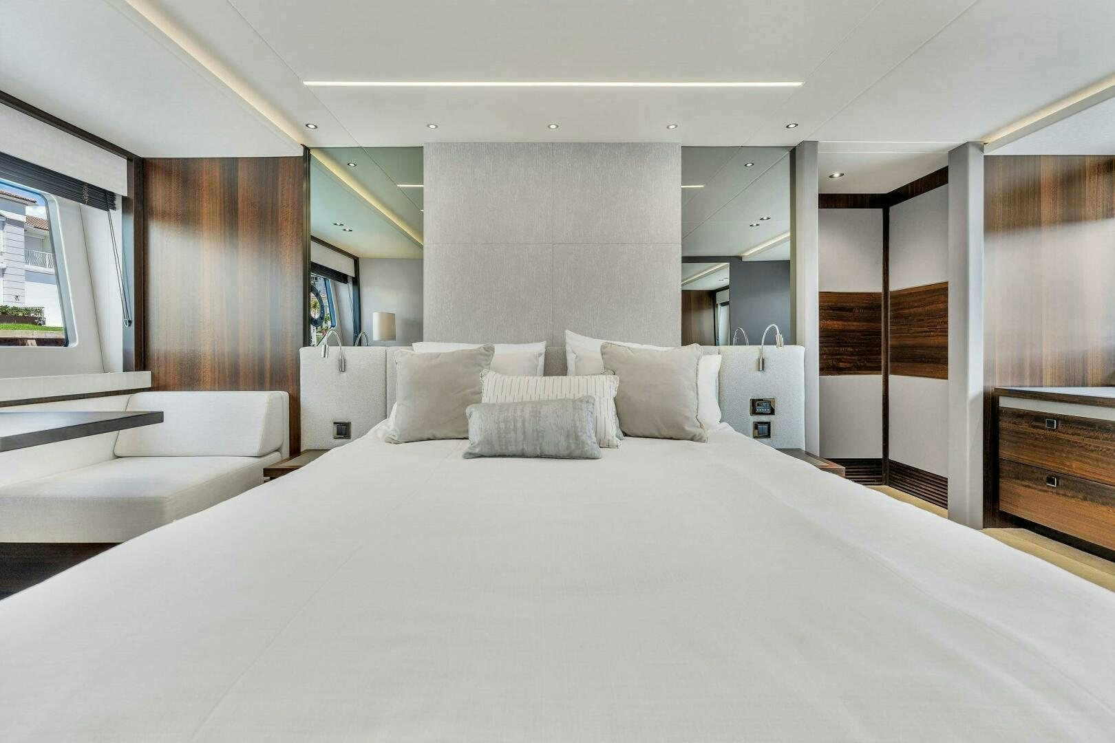 a large bed in a room aboard YOU AND ISLANDS Yacht for Sale