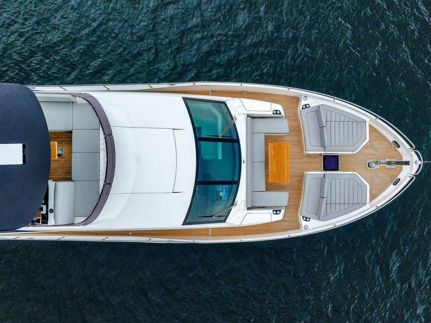 a white building with a balcony aboard YOU AND ISLANDS Yacht for Sale