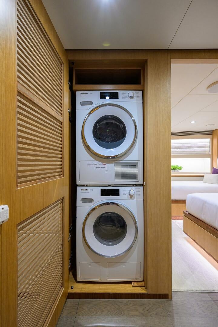 a washing machine in a room aboard AQUA LIFE Yacht for Sale
