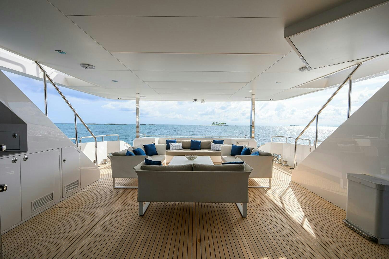 a large living room with a large balcony aboard AQUA LIFE Yacht for Sale