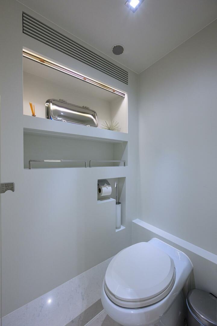 a small bathroom with a toilet aboard AQUA LIFE Yacht for Sale