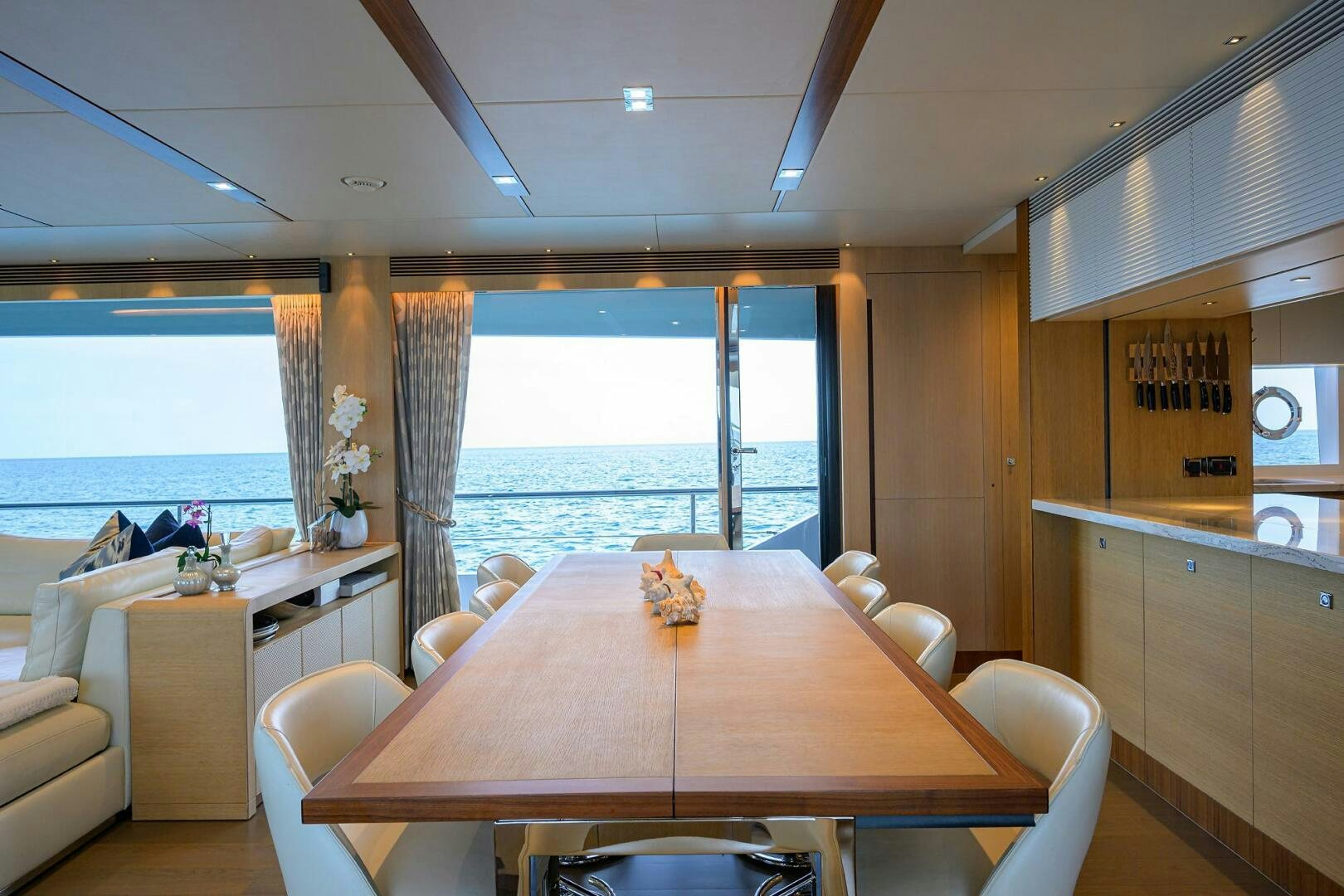 a dining table in a kitchen aboard AQUA LIFE Yacht for Sale
