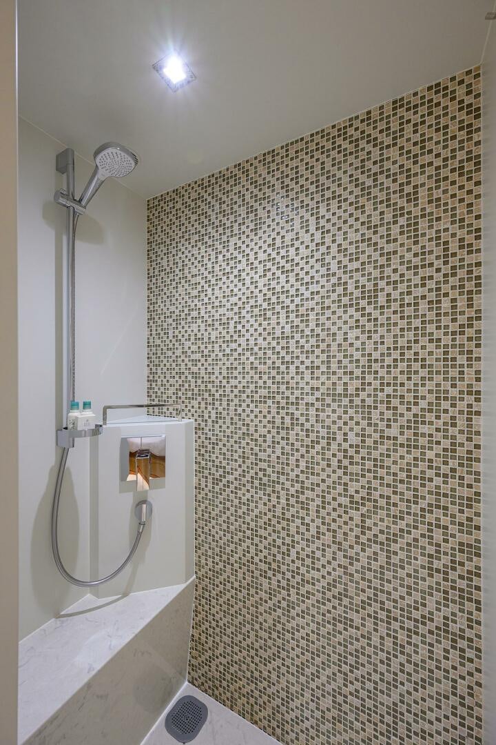 a urinal in a bathroom aboard AQUA LIFE Yacht for Sale