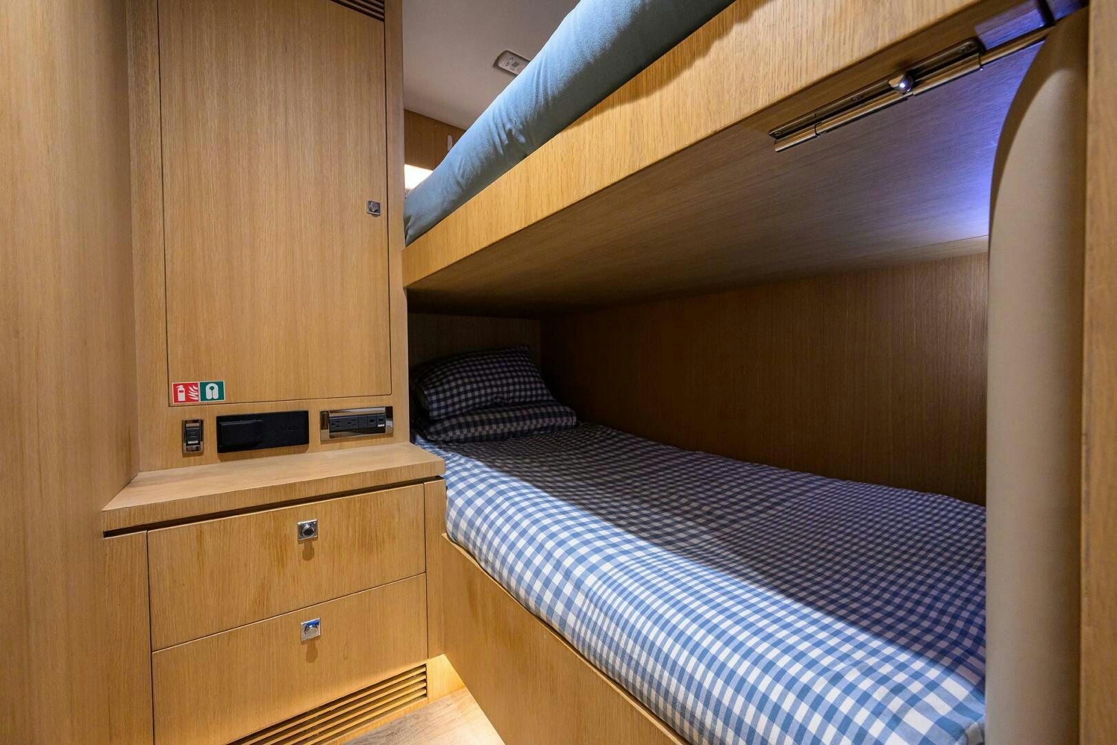 a bed in a room aboard AQUA LIFE Yacht for Sale