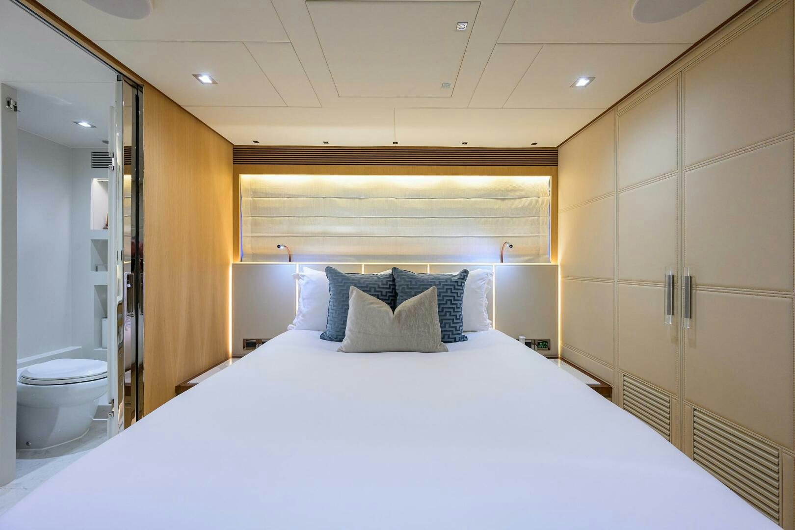 a bed in a room aboard AQUA LIFE Yacht for Sale