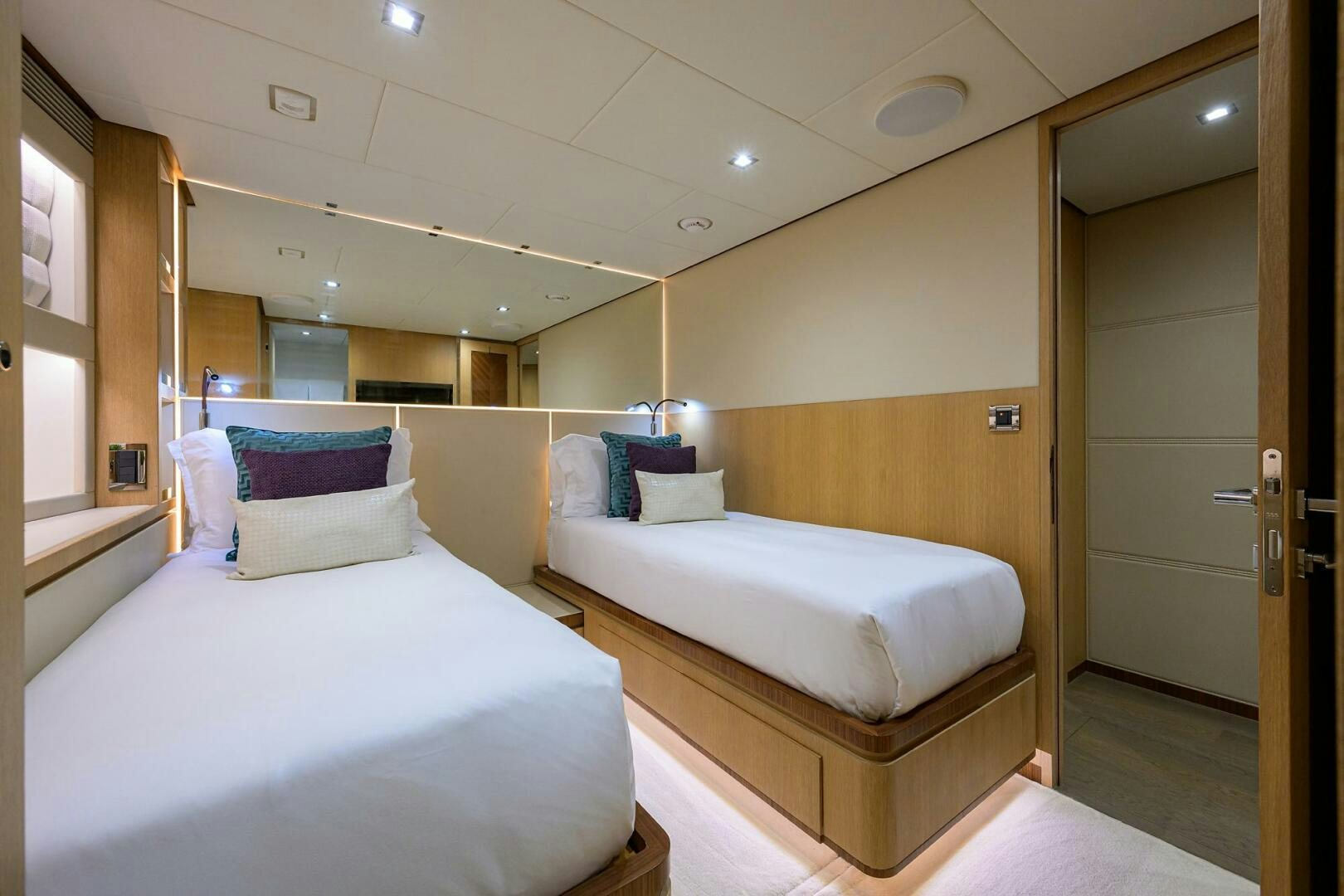 a room with two beds aboard AQUA LIFE Yacht for Sale