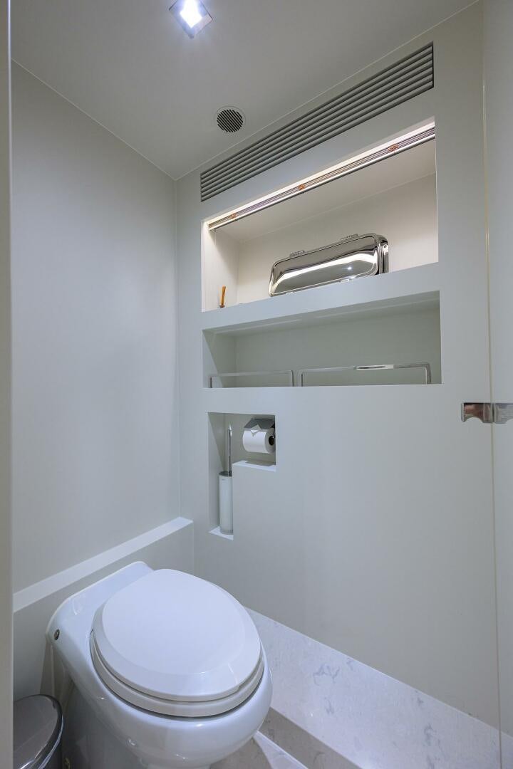 a small bathroom with a toilet aboard AQUA LIFE Yacht for Sale