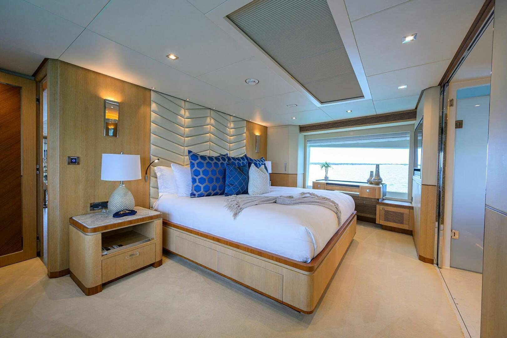 a large bedroom with a large bed aboard AQUA LIFE Yacht for Sale
