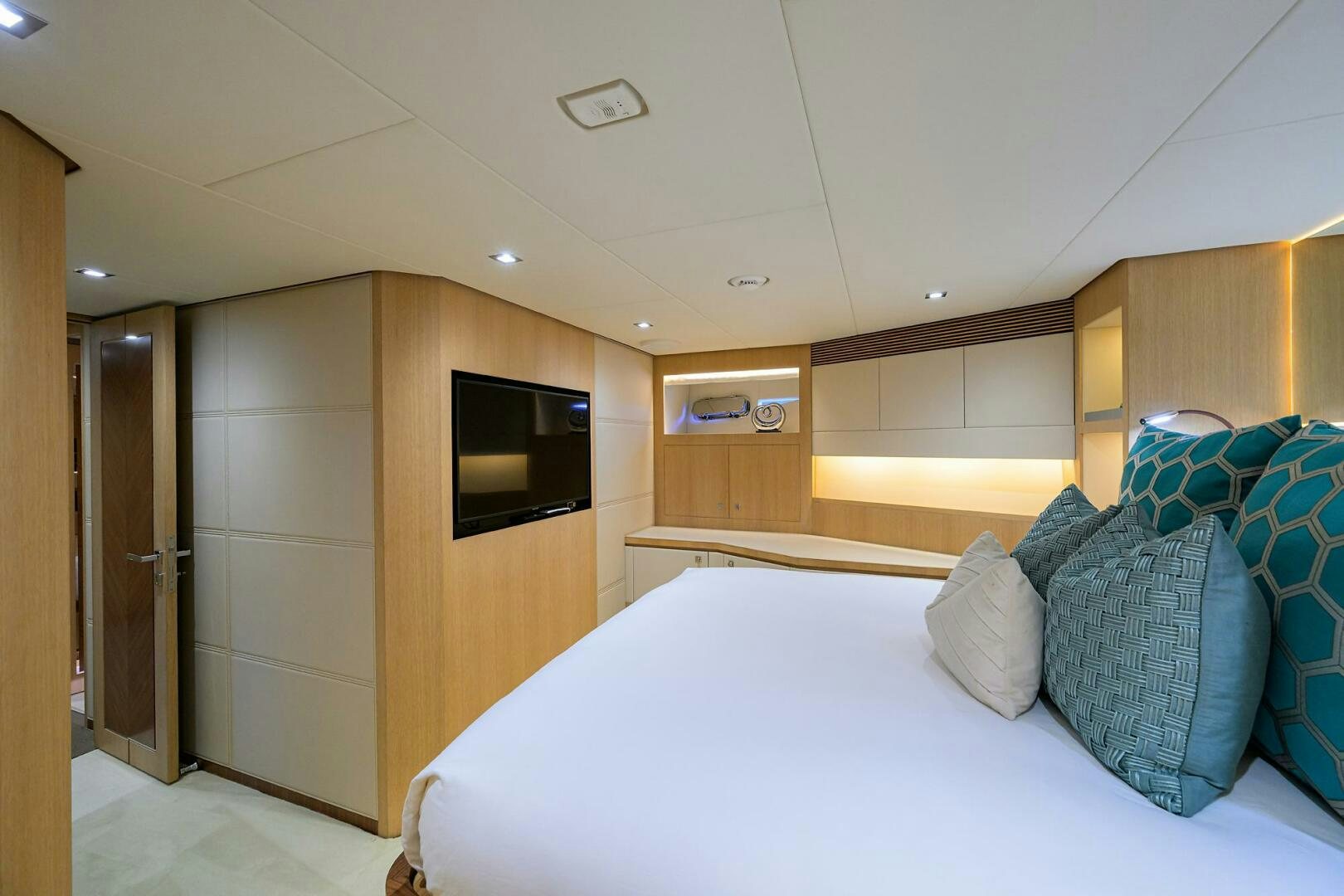 a bed in a room aboard AQUA LIFE Yacht for Sale