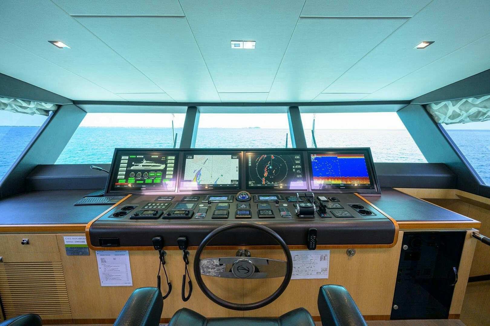 a control panel with many monitors aboard AQUA LIFE Yacht for Sale