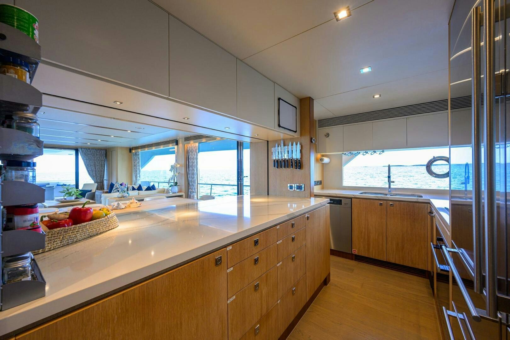 a kitchen with a large island aboard AQUA LIFE Yacht for Sale