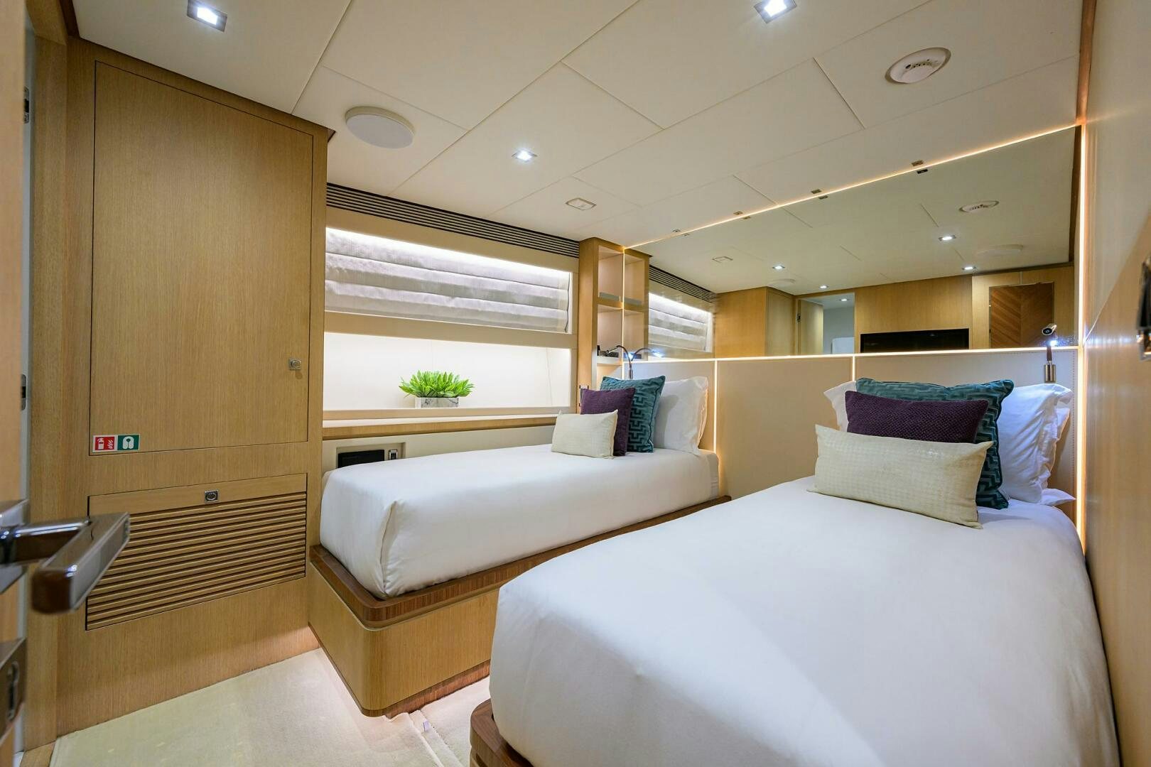 a room with two beds aboard AQUA LIFE Yacht for Sale