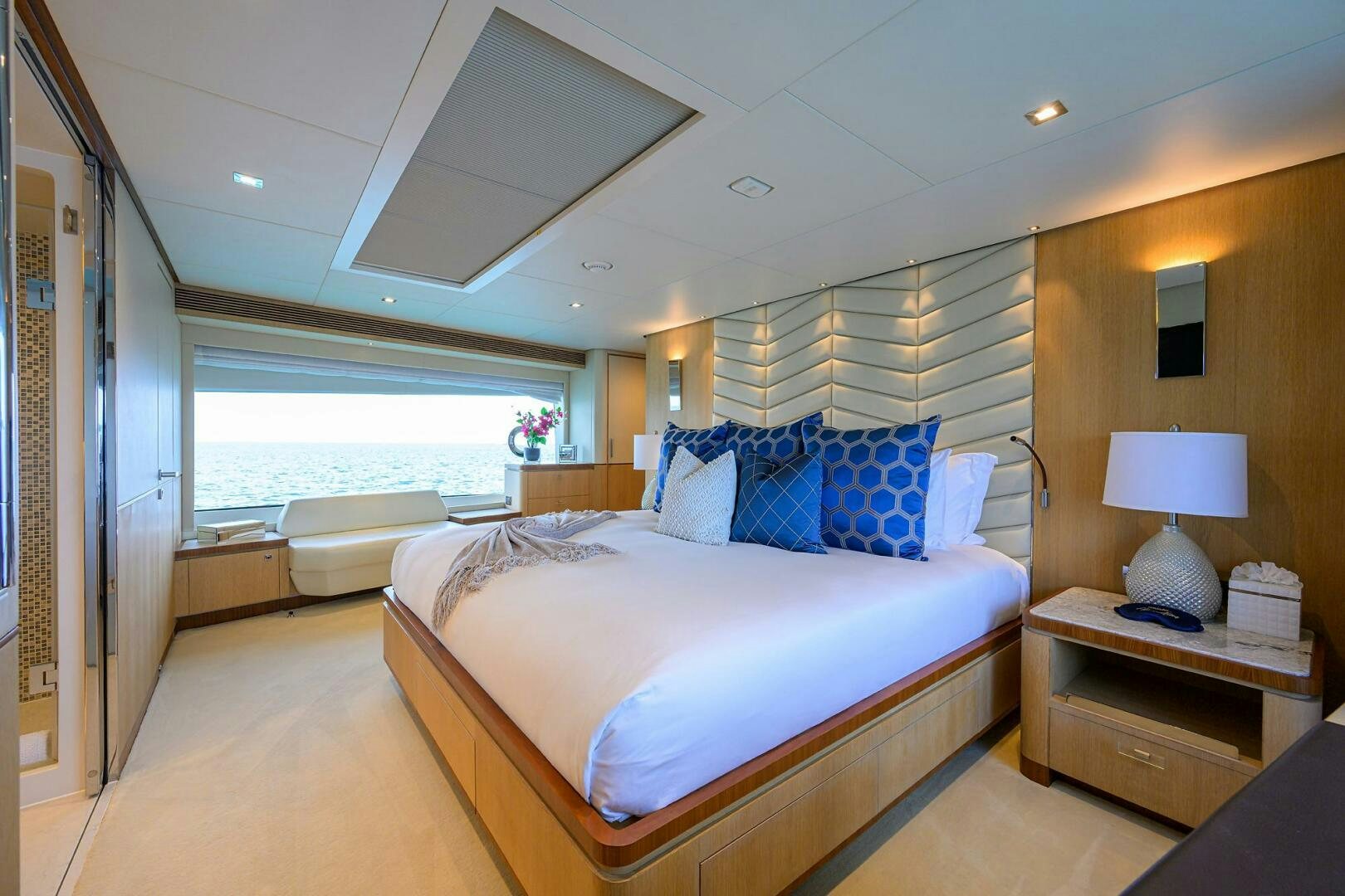 a bedroom with a large bed aboard AQUA LIFE Yacht for Sale
