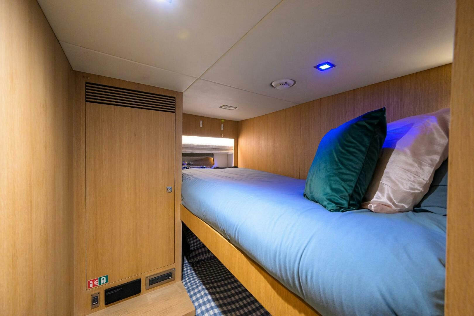 a bed in a room aboard AQUA LIFE Yacht for Sale