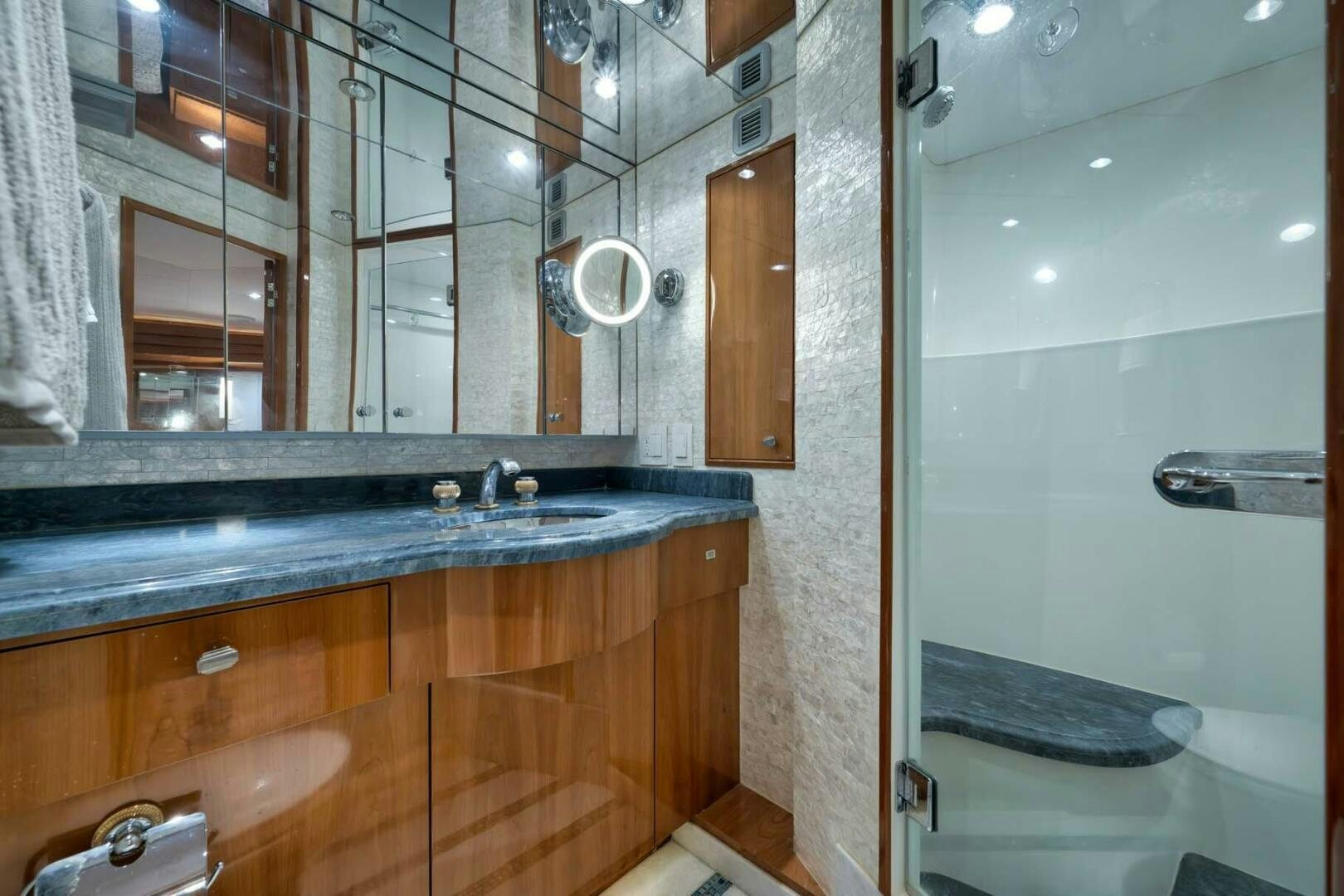 a bathroom with a sink and a mirror aboard REEL TRADER Yacht for Sale