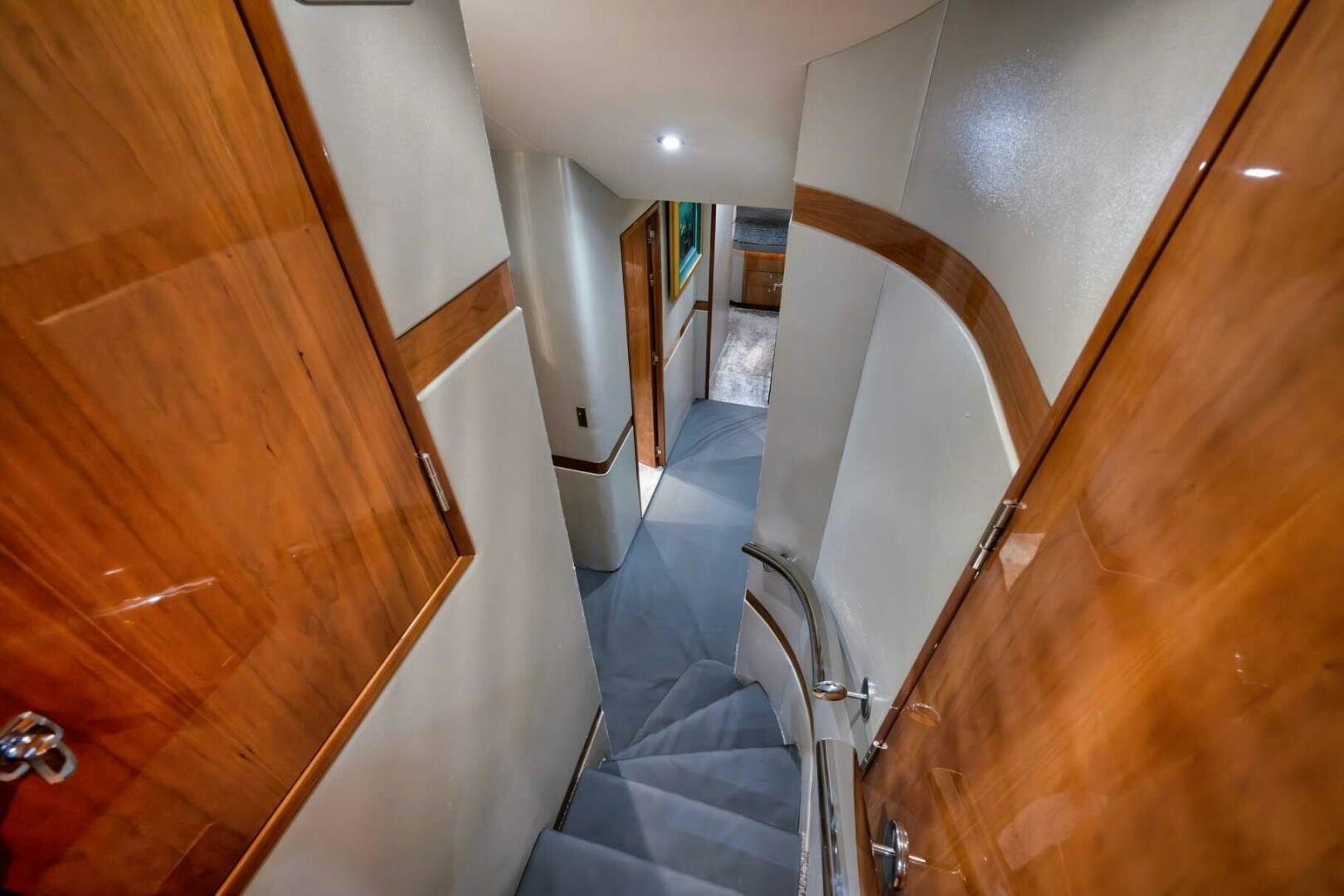 a hallway with wooden floors aboard REEL TRADER Yacht for Sale