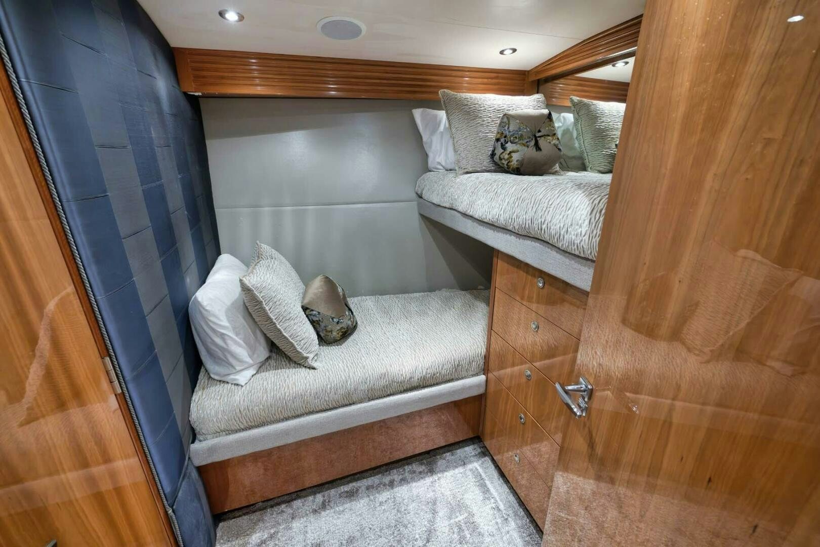 a room with two beds aboard REEL TRADER Yacht for Sale