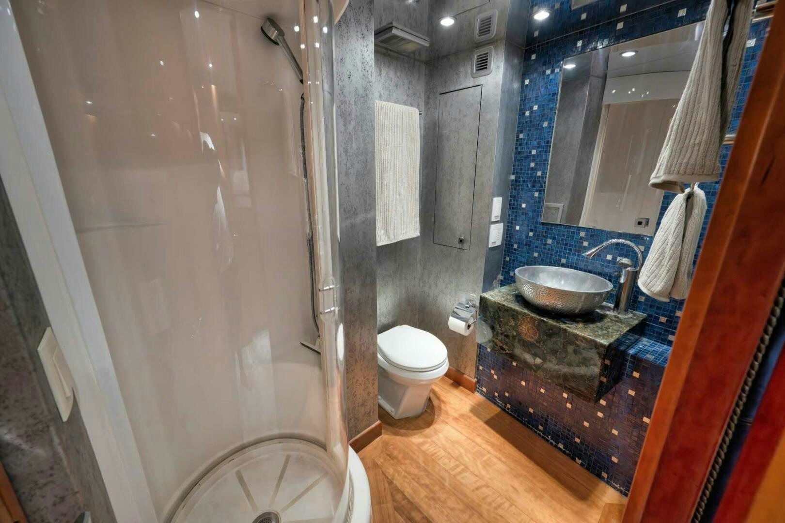 a bathroom with a marble counter aboard REEL TRADER Yacht for Sale