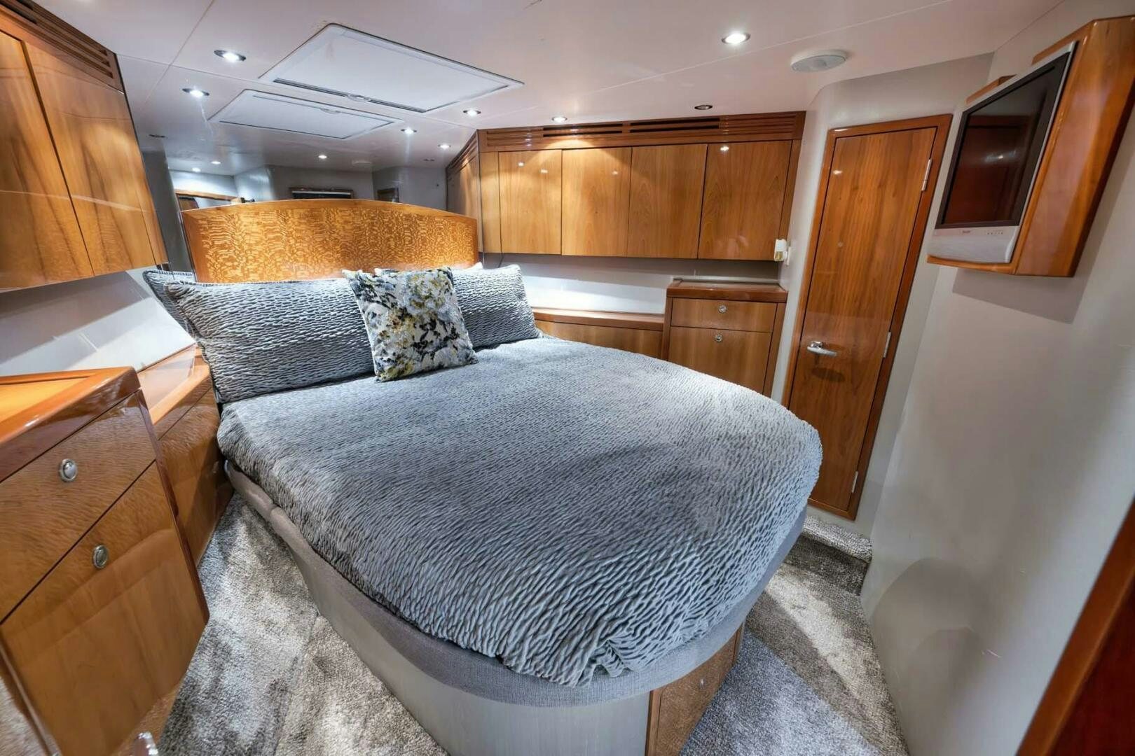 a bed in a room aboard REEL TRADER Yacht for Sale