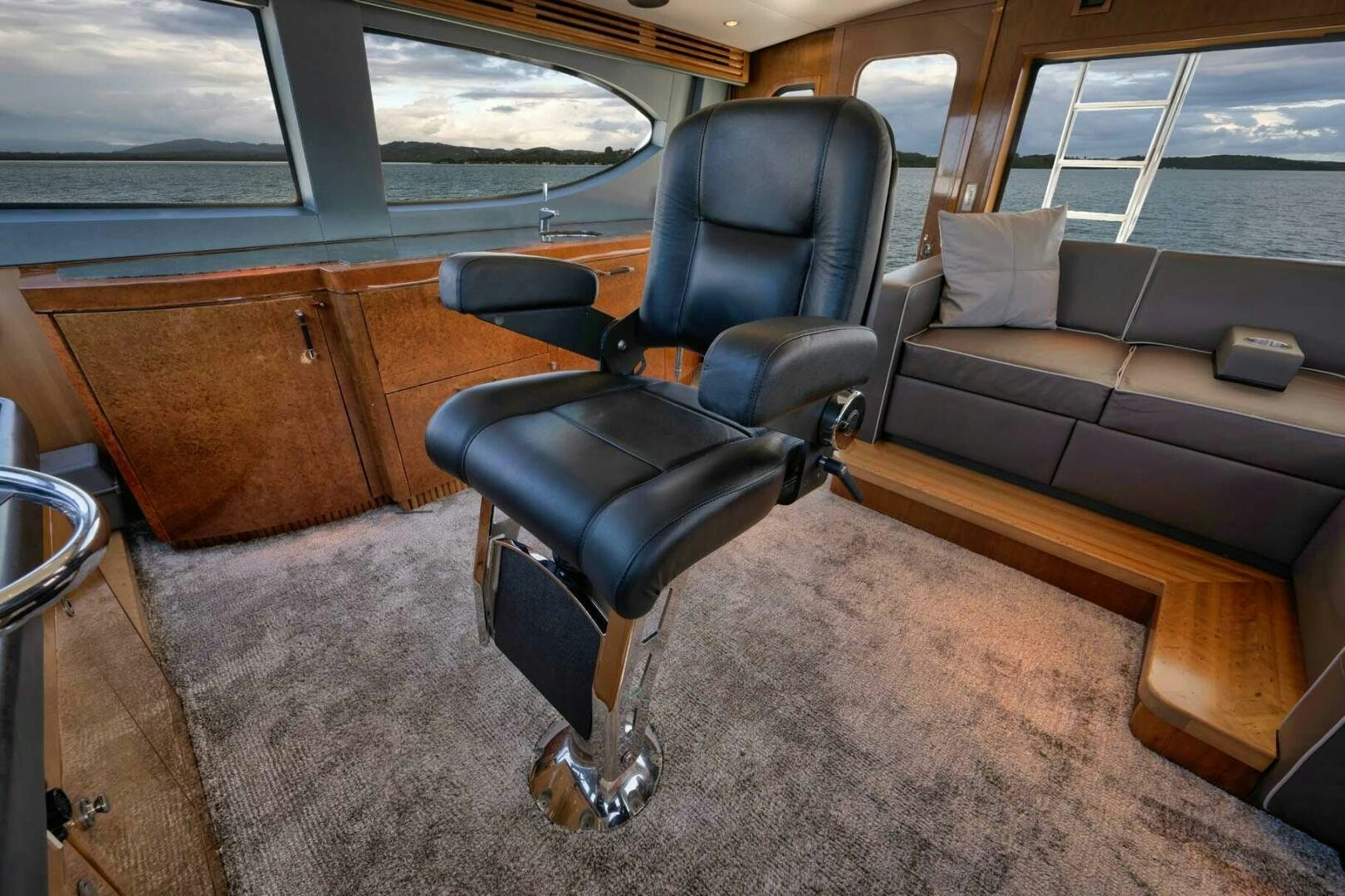 a black office chair in a room aboard REEL TRADER Yacht for Sale