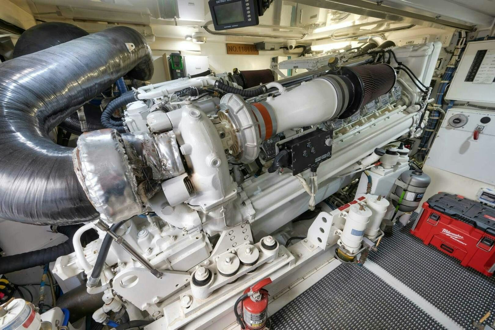 a car engine with a hood aboard REEL TRADER Yacht for Sale