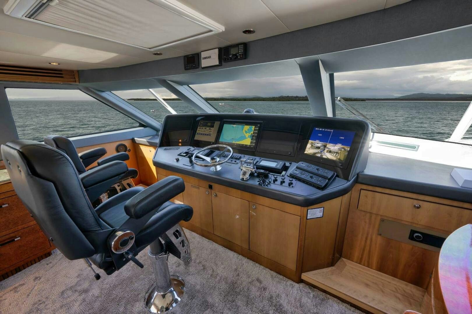 a room with a desk and computer aboard REEL TRADER Yacht for Sale