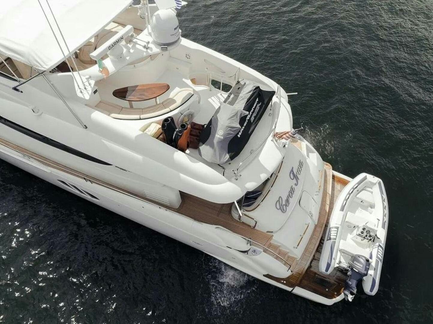 a white boat on the water aboard CERCA TROVA Yacht for Sale