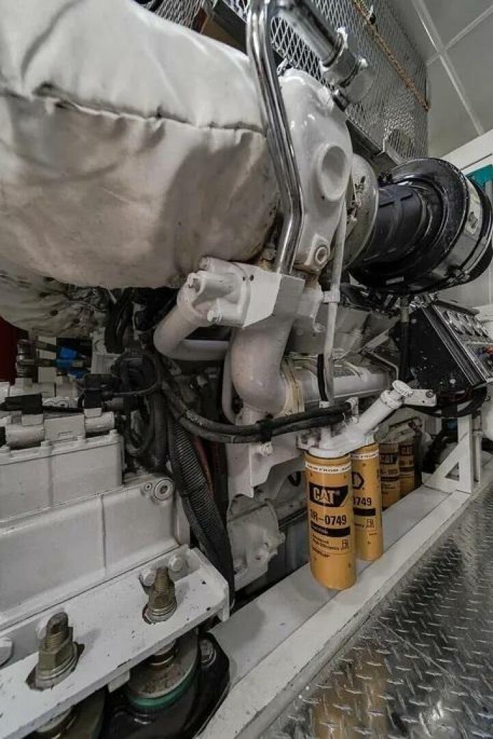 a machine with a large metal pipe aboard CERCA TROVA Yacht for Sale