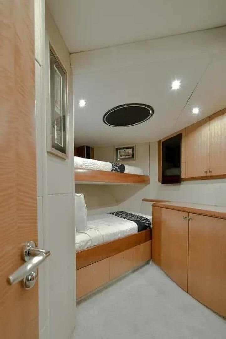 a bathroom with a sink and a mirror aboard CERCA TROVA Yacht for Sale