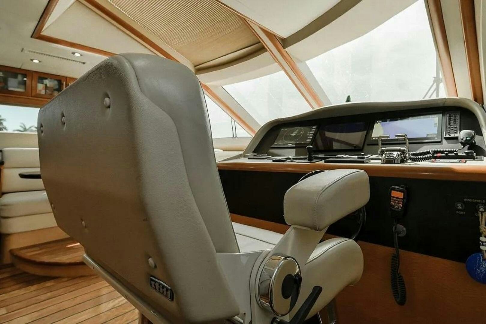 a car with a large wheel aboard CERCA TROVA Yacht for Sale
