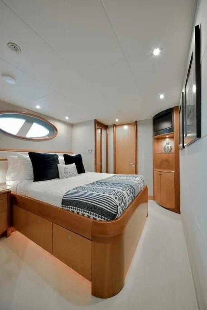 a bed in a room aboard CERCA TROVA Yacht for Sale